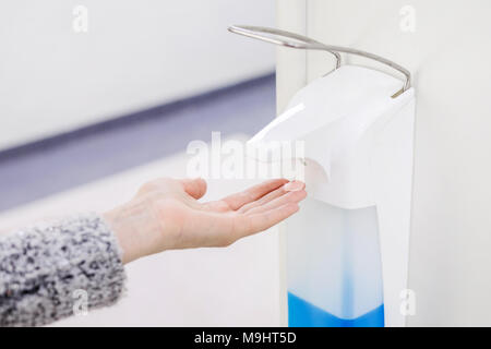 Antiseptic disinfectant hand wash gel dispenser mounted on